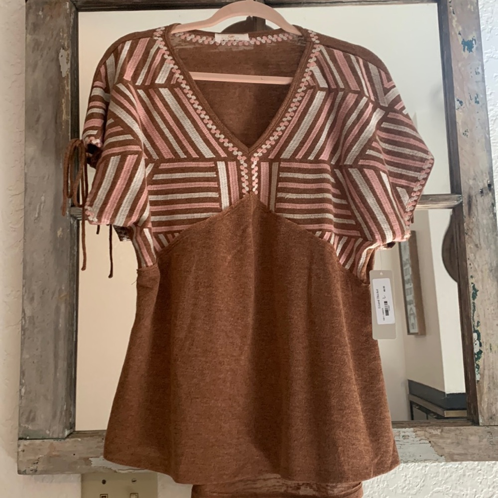 Sunland17 top size large. New with tags.
